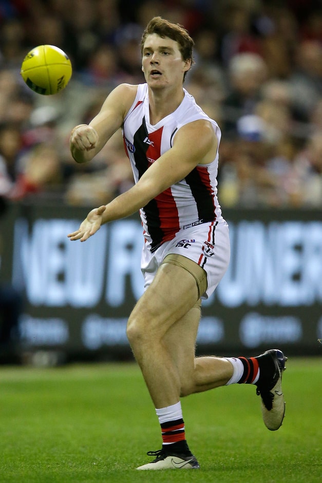 AFL 2016 Rd 06 - Melbourne v St Kilda MELBOURNE, AUSTRALIA - APRIL 30: Blake Acres of the Saints handballs during the 2016 AFL Round 06 match between the Melbourne Demons and the St Kilda Saints at Etihad Stadium, Melbourne on April 30, 2016. (Photo by Darrian Traynor/AFL Media)